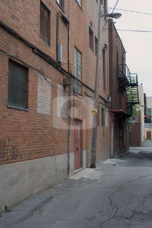 To use this stock image in your creative project, please select the size you need over to the right and click the "Add to Cart" button.
Your downloaded image will come with the Cutcaster watermark removed so don’t worry about the watermark you see on this page. Back alley stock photo, Back alley in downtown montreal by Yann Poirier