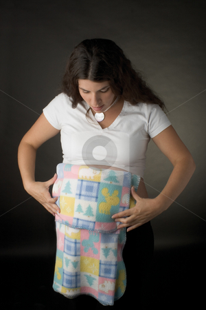 To use this stock image in your creative project, please select the size you need over to the right and click the "Add to Cart" button.
Your downloaded image will come with the Cutcaster watermark removed so don’t worry about the watermark you see on this page. Women folding blanket stock photo, by Yann Poirier