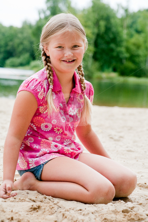 To use this stock image in your creative project, please select the size you need over to the right and click the "Add to Cart" button.
Your downloaded image will come with the Cutcaster watermark removed so don’t worry about the watermark you see on this page. Sweet young child in the sand stock photo, Happy children having fun in the park by Frenk and Danielle Kaufmann