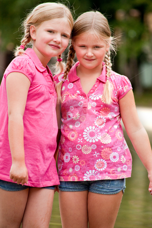 To use this stock image in your creative project, please select the size you need over to the right and click the "Add to Cart" button.
Your downloaded image will come with the Cutcaster watermark removed so don’t worry about the watermark you see on this page. Girlfriends in the sun stock photo, Happy children having fun in the park by Frenk and Danielle Kaufmann