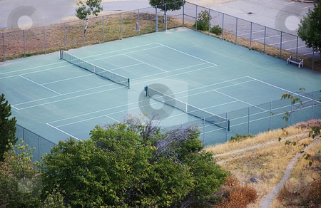 To use this stock image in your creative project, please select the size you need over to the right and click the "Add to Cart" button.
Your downloaded image will come with the Cutcaster watermark removed so don’t worry about the watermark you see on this page. Tennis Courts stock photo, This photo is of two tennis courts in a mountain setting with the view of looking down upon them. by Valerie Garner