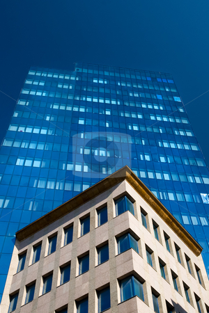 To use this stock image in your creative project, please select the size you need over to the right and click the "Add to Cart" button.
Your downloaded image will come with the Cutcaster watermark removed so don’t worry about the watermark you see on this page. Modern Architecture stock photo, Modern architecture in the Warsaw downtown, Poland. by Rognar