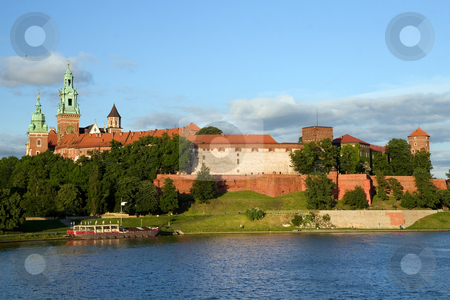 To use this stock image in your creative project, please select the size you need over to the right and click the "Add to Cart" button.
Your downloaded image will come with the Cutcaster watermark removed so don’t worry about the watermark you see on this page. The Wawel Royal Castle and Vistula River stock photo, The Wawel Royal Castle in Cracow, Poland built in 14th at the behest of Casimir III the Great, rebuilt by Jogaila and Jadwiga of Poland. Vistula river on the first plan. by Rognar