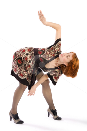 To use this stock image in your creative project, please select the size you need over to the right and click the "Add to Cart" button.
Your downloaded image will come with the Cutcaster watermark removed so don’t worry about the watermark you see on this page. Fashion Woman in Original Pose stock photo, Young attractive fashion model in strange looking original pose, isolated on white background. by Rognar