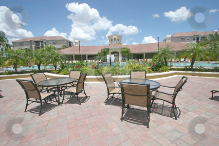 To use this stock image in your creative project, please select the size you need over to the right and click the "Add to Cart" button.
Your downloaded image will come with the Cutcaster watermark removed so don’t worry about the watermark you see on this page. Pool Area stock photo, Chairs and Table around a Pool Area by Lucy Clark