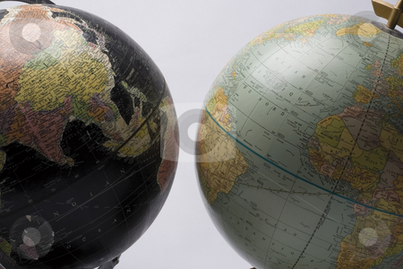 To use this stock image in your creative project, please select the size you need over to the right and click the "Add to Cart" button.
Your downloaded image will come with the Cutcaster watermark removed so don’t worry about the watermark you see on this page. Dark Globe Asian to Light Globe America stock photo, A dark globe showing asia facing a light globe showing america by Yann Poirier
