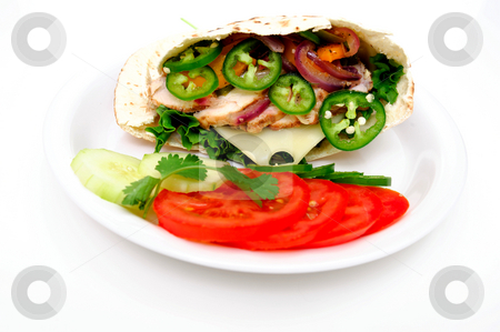 To use this stock image in your creative project, please select the size you need over to the right and click the "Add to Cart" button.
Your downloaded image will come with the Cutcaster watermark removed so don’t worry about the watermark you see on this page. Pita Bread Sandwich stock photo, Grilled chicken flatbread sandwich with lettuce, swiss cheese, grilled onions and bell pepper with sliced jalapeno chili. Sliced tomatoes, cucumber and a sprig o cilantro on a white plate by Lynn Bendickson
