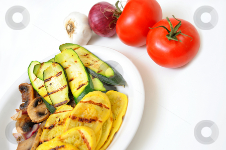 To use this stock image in your creative project, please select the size you need over to the right and click the "Add to Cart" button.
Your downloaded image will come with the Cutcaster watermark removed so don’t worry about the watermark you see on this page. Grilled Squash And Mushrooms stock photo, Zucchini and yellow summer squash grilled with suateed munskrooms and onions with raw tomatoes, red onion and garlic on a white background by Lynn Bendickson