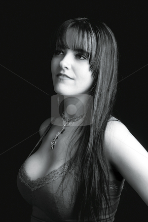 To use this stock image in your creative project, please select the size you need over to the right and click the "Add to Cart" button.
Your downloaded image will come with the Cutcaster watermark removed so don’t worry about the watermark you see on this page. Fashion model - profile stock photo, Profile portrait of a twenty something fashion model in black and white by Yann Poirier