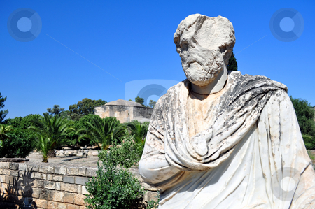 To use this stock image in your creative project, please select the size you need over to the right and click the "Add to Cart" button.
Your downloaded image will come with the Cutcaster watermark removed so don’t worry about the watermark you see on this page. Greek statue stock photo, Travel photography: marble roman statue and the Ayios Titos Basilica at Gortyn by Fernando Barozza