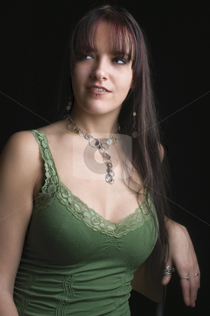To use this stock image in your creative project, please select the size you need over to the right and click the "Add to Cart" button.
Your downloaded image will come with the Cutcaster watermark removed so don’t worry about the watermark you see on this page. Fashion model - looking side way stock photo, Twenty something fashion model leaning on a chair looking side ways by Yann Poirier