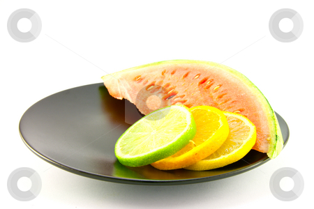 To use this stock image in your creative project, please select the size you need over to the right and click the "Add to Cart" button.
Your downloaded image will come with the Cutcaster watermark removed so don’t worry about the watermark you see on this page. Watermelon with Slice of Lemon, Lime and Orange stock photo, Slice of red juicy watermelon with a slice of lemon, lime and orange on a black plate with a white background by Keith Wilson