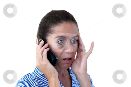 To use this stock image in your creative project, please select the size you need over to the right and click the "Add to Cart" button.
Your downloaded image will come with the Cutcaster watermark removed so don’t worry about the watermark you see on this page. Middle Aged Business Woman Looking Shocked on the Phone stock photo, Middle aged business woman on the telephone looking shocked on a white background by Keith Wilson