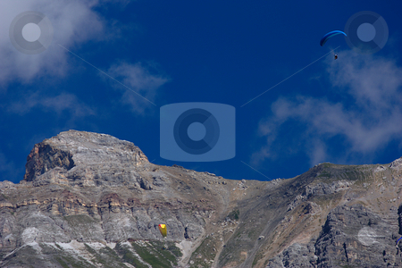 To use this stock image in your creative project, please select the size you need over to the right and click the "Add to Cart" button.
Your downloaded image will come with the Cutcaster watermark removed so don’t worry about the watermark you see on this page. Paragliding in the Alps stock photo, Paragliders in Neustift in the Stubaital / Austria by Andre Janssen
