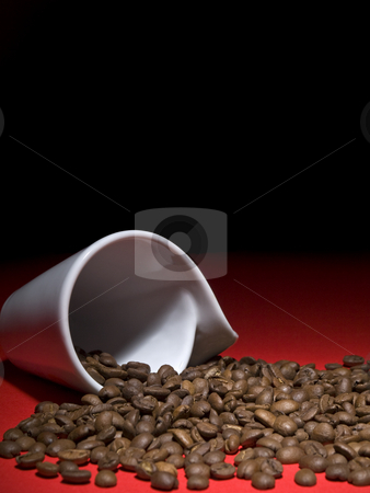 To use this stock image in your creative project, please select the size you need over to the right and click the "Add to Cart" button.
Your downloaded image will come with the Cutcaster watermark removed so don’t worry about the watermark you see on this page. Coffee beans stock photo, A fallen cup with coffee beans spread out. by Ignacio Gonzalez Prado