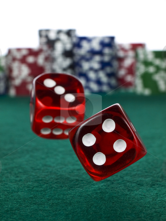 To use this stock image in your creative project, please select the size you need over to the right and click the "Add to Cart" button.
Your downloaded image will come with the Cutcaster watermark removed so don’t worry about the watermark you see on this page. Betting with dices stock photo, Two red dices rolling over a green felt. Out of focus stack of colorful chips on the background. by Ignacio Gonzalez Prado