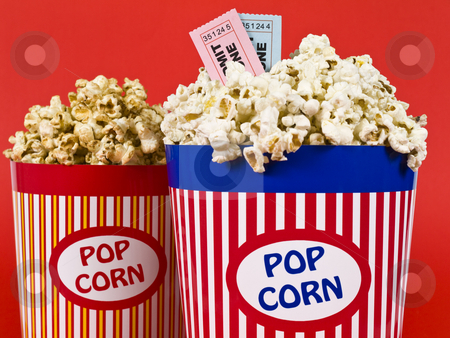 To use this stock image in your creative project, please select the size you need over to the right and click the "Add to Cart" button.
Your downloaded image will come with the Cutcaster watermark removed so don’t worry about the watermark you see on this page. Fun dating stock photo, Two popcorn buckets over a red background. Movie stubs sitting over the popcorn. by Ignacio Gonzalez Prado