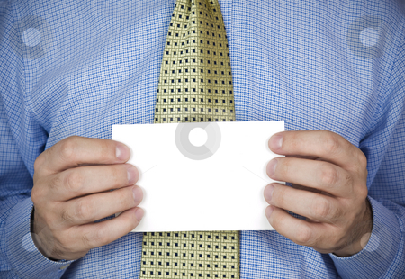 To use this stock image in your creative project, please select the size you need over to the right and click the "Add to Cart" button.
Your downloaded image will come with the Cutcaster watermark removed so don’t worry about the watermark you see on this page. Holding a card stock photo, An office man holding a blank card with his hands. by Ignacio Gonzalez Prado