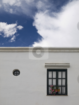 To use this stock image in your creative project, please select the size you need over to the right and click the "Add to Cart" button.
Your downloaded image will come with the Cutcaster watermark removed so don’t worry about the watermark you see on this page. White house stock photo, Facade of a white simple mediterranean house. by Ignacio Gonzalez Prado