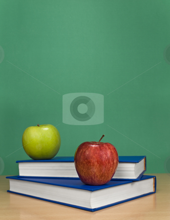 To use this stock image in your creative project, please select the size you need over to the right and click the "Add to Cart" button.
Your downloaded image will come with the Cutcaster watermark removed so don’t worry about the watermark you see on this page. Blank chalkboard stock photo, A blank chalkboard with apples over books. by Ignacio Gonzalez Prado