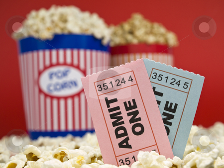 To use this stock image in your creative project, please select the size you need over to the right and click the "Add to Cart" button.
Your downloaded image will come with the Cutcaster watermark removed so don’t worry about the watermark you see on this page. Movie stubs and popcorn stock photo, Two popcorn buckets over a red background. Movie stubs sitting over the popcorn. by Ignacio Gonzalez Prado