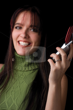 To use this stock image in your creative project, please select the size you need over to the right and click the "Add to Cart" button.
Your downloaded image will come with the Cutcaster watermark removed so don’t worry about the watermark you see on this page. Fashion model - big smile on cell stock photo, Twenty something fashion model holding cell phone with big smile by Yann Poirier