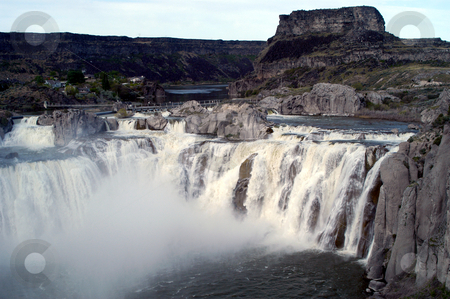 To use this stock image in your creative project, please select the size you need over to the right and click the "Add to Cart" button.
Your downloaded image will come with the Cutcaster watermark removed so don’t worry about the watermark you see on this page. Shoshone Falls stock photo, USA, Idaho, Twin Falls, Shoshone Falls by David Ryan