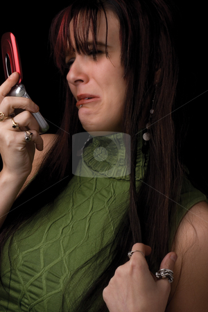To use this stock image in your creative project, please select the size you need over to the right and click the "Add to Cart" button.
Your downloaded image will come with the Cutcaster watermark removed so don’t worry about the watermark you see on this page. Fashion model - Upset over call on cell stock photo, Twenty something fashion model upset over call on cell phone by Yann Poirier