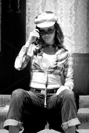 To use this stock image in your creative project, please select the size you need over to the right and click the "Add to Cart" button.
Your downloaded image will come with the Cutcaster watermark removed so don’t worry about the watermark you see on this page. Girl sitting on stair stock photo, Twenty someting fashion model sitting on stairs by Yann Poirier