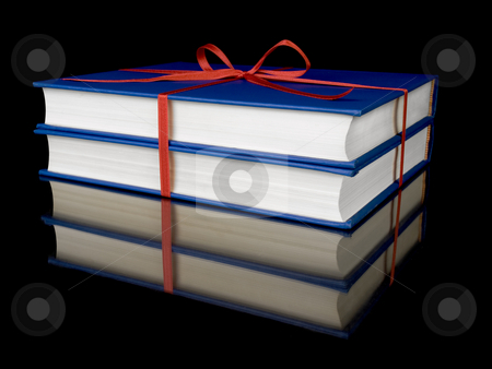 To use this stock image in your creative project, please select the size you need over to the right and click the "Add to Cart" button.
Your downloaded image will come with the Cutcaster watermark removed so don’t worry about the watermark you see on this page. Two blue books stock photo, Two blue books with red silk ribbon, isolated on black background. by Ignacio Gonzalez Prado