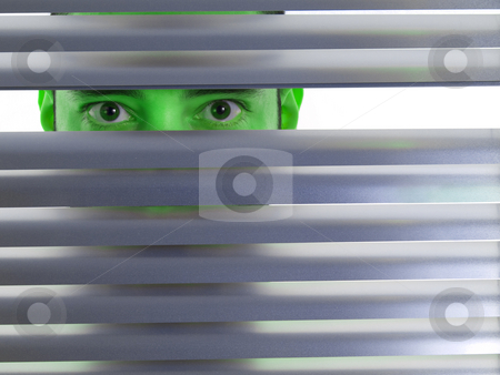 To use this stock image in your creative project, please select the size you need over to the right and click the "Add to Cart" button.
Your downloaded image will come with the Cutcaster watermark removed so don’t worry about the watermark you see on this page. Green peeping Tom stock photo, A green man looks to the camera through the blinds. by Ignacio Gonzalez Prado