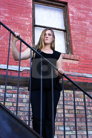 To use this stock image in your creative project, please select the size you need over to the right and click the "Add to Cart" button.
Your downloaded image will come with the Cutcaster watermark removed so don’t worry about the watermark you see on this page. Beautiful Girl posing outdoors on stairs in the City stock photo, Beautiful Girl in Black dress posing outdoors in the City - Urban by Mehmet Dilsiz