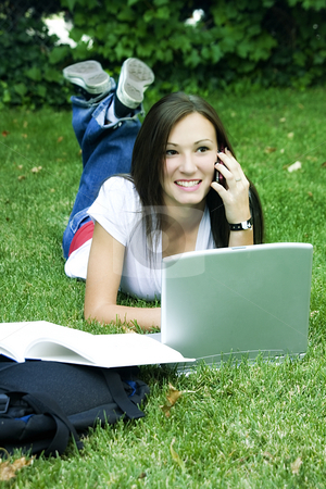 To use this stock image in your creative project, please select the size you need over to the right and click the "Add to Cart" button.
Your downloaded image will come with the Cutcaster watermark removed so don’t worry about the watermark you see on this page. Cute teen girl laying down on the grass studying stock photo, Cute teen girl laying down on the grass studying with her laptop by Mehmet Dilsiz