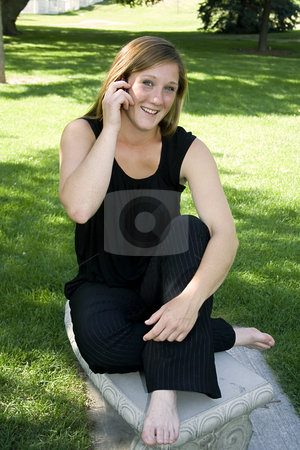 To use this stock image in your creative project, please select the size you need over to the right and click the "Add to Cart" button.
Your downloaded image will come with the Cutcaster watermark removed so don’t worry about the watermark you see on this page. Beautiful Girl in the Park in a Black Dress Talking on the Phone stock photo, Close up on a Beautiful in a Black Dress sitting on the Bench Talking on a Cell Phone by Mehmet Dilsiz