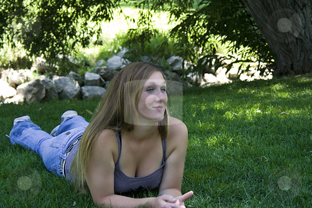 To use this stock image in your creative project, please select the size you need over to the right and click the "Add to Cart" button.
Your downloaded image will come with the Cutcaster watermark removed so don’t worry about the watermark you see on this page. Beautiful Girl in the Park stock photo, Close up on a Beautiful Girl Laying Down in the Park by Mehmet Dilsiz