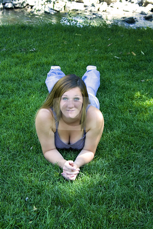 To use this stock image in your creative project, please select the size you need over to the right and click the "Add to Cart" button.
Your downloaded image will come with the Cutcaster watermark removed so don’t worry about the watermark you see on this page. Beautiful Girl in the Park stock photo, Close up on a Beautiful Girl Laying Down in the Park by Mehmet Dilsiz