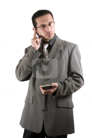 To use this stock image in your creative project, please select the size you need over to the right and click the "Add to Cart" button.
Your downloaded image will come with the Cutcaster watermark removed so don’t worry about the watermark you see on this page. Businessman on the PDA phone with an ear piece stock photo, Businessman on the phone with PDA in hand and an earpiece by Mehmet Dilsiz