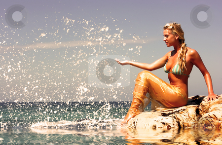 To use this stock image in your creative project, please select the size you need over to the right and click the "Add to Cart" button.
Your downloaded image will come with the Cutcaster watermark removed so don’t worry about the watermark you see on this page. Mermaid at beach stock photo, Blonde mermaid sitting on the rocky beach by Dmitry Rostovtsev