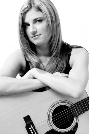 To use this stock image in your creative project, please select the size you need over to the right and click the "Add to Cart" button.
Your downloaded image will come with the Cutcaster watermark removed so don’t worry about the watermark you see on this page. Women with accoustic guitar stock photo, Thirty something women sitting on stule leaning on accoustic guitar by Yann Poirier