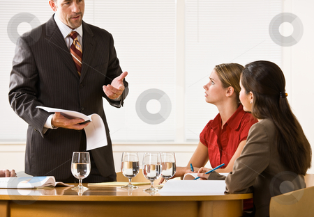 To use this stock image in your creative project, please select the size you need over to the right and click the "Add to Cart" button.
Your downloaded image will come with the Cutcaster watermark removed so don’t worry about the watermark you see on this page. Business people in a meeting stock photo, Business people in a meeting by Jonathan Ross