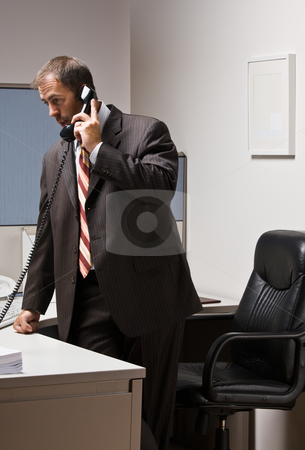 To use this stock image in your creative project, please select the size you need over to the right and click the "Add to Cart" button.
Your downloaded image will come with the Cutcaster watermark removed so don’t worry about the watermark you see on this page. Businessman talking on telephone stock photo, Businessman talking on telephone by Jonathan Ross