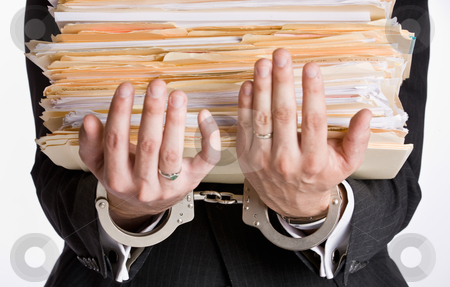 To use this stock image in your creative project, please select the size you need over to the right and click the "Add to Cart" button.
Your downloaded image will come with the Cutcaster watermark removed so don’t worry about the watermark you see on this page. Businessman in handcuffs holding file folders stock photo, Businessman in handcuffs holding file folders by Jonathan Ross