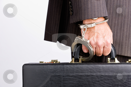 To use this stock image in your creative project, please select the size you need over to the right and click the "Add to Cart" button.
Your downloaded image will come with the Cutcaster watermark removed so don’t worry about the watermark you see on this page. Businessman handcuffed to briefcase stock photo, Businessman handcuffed to briefcase by Jonathan Ross