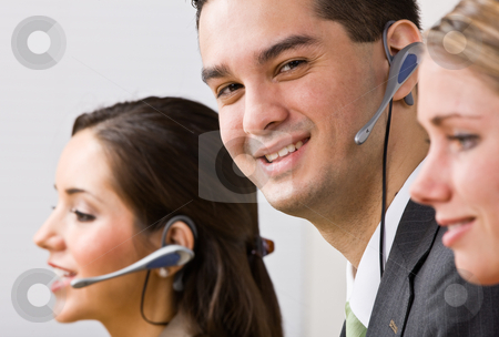 To use this stock image in your creative project, please select the size you need over to the right and click the "Add to Cart" button.
Your downloaded image will come with the Cutcaster watermark removed so don’t worry about the watermark you see on this page. Business people talking on headsets stock photo, Business people talking on headsets by Jonathan Ross