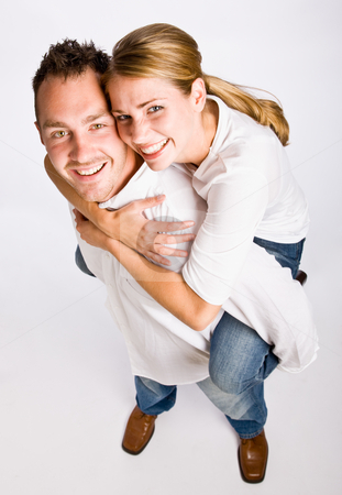 To use this stock image in your creative project, please select the size you need over to the right and click the "Add to Cart" button.
Your downloaded image will come with the Cutcaster watermark removed so don’t worry about the watermark you see on this page. Boyfriend giving girlfriend piggy back ride stock photo, Boyfriend giving girlfriend piggy back ride by Jonathan Ross