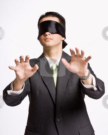 To use this stock image in your creative project, please select the size you need over to the right and click the "Add to Cart" button.
Your downloaded image will come with the Cutcaster watermark removed so don’t worry about the watermark you see on this page. Businessman in blindfold stock photo, Businessman in blindfold by Jonathan Ross