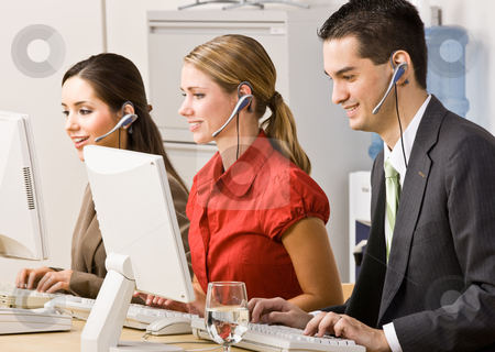 To use this stock image in your creative project, please select the size you need over to the right and click the "Add to Cart" button.
Your downloaded image will come with the Cutcaster watermark removed so don’t worry about the watermark you see on this page. Business people talking on headsets stock photo, Business people talking on headsets by Jonathan Ross