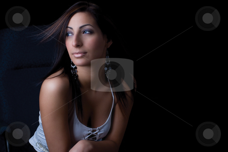 To use this stock image in your creative project, please select the size you need over to the right and click the "Add to Cart" button.
Your downloaded image will come with the Cutcaster watermark removed so don’t worry about the watermark you see on this page. Sexy corporate stock photo, Twenty something fashion model sitting on office chair looking in the distance with a very calm attitude by Yann Poirier