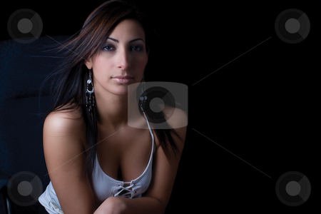 To use this stock image in your creative project, please select the size you need over to the right and click the "Add to Cart" button.
Your downloaded image will come with the Cutcaster watermark removed so don’t worry about the watermark you see on this page. Sexy corporate stock photo, Twenty something fashion model sitting on office chair looking very calm attitude by Yann Poirier
