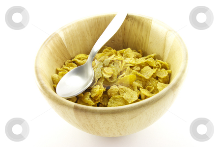 To use this stock image in your creative project, please select the size you need over to the right and click the "Add to Cart" button.
Your downloaded image will come with the Cutcaster watermark removed so don’t worry about the watermark you see on this page. Cornflakes in a Bowl stock photo, Golden cornflakes in a wooden bowl with a spoon on a white background by Keith Wilson